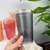 6 colorful juice glasses in their vintage basket