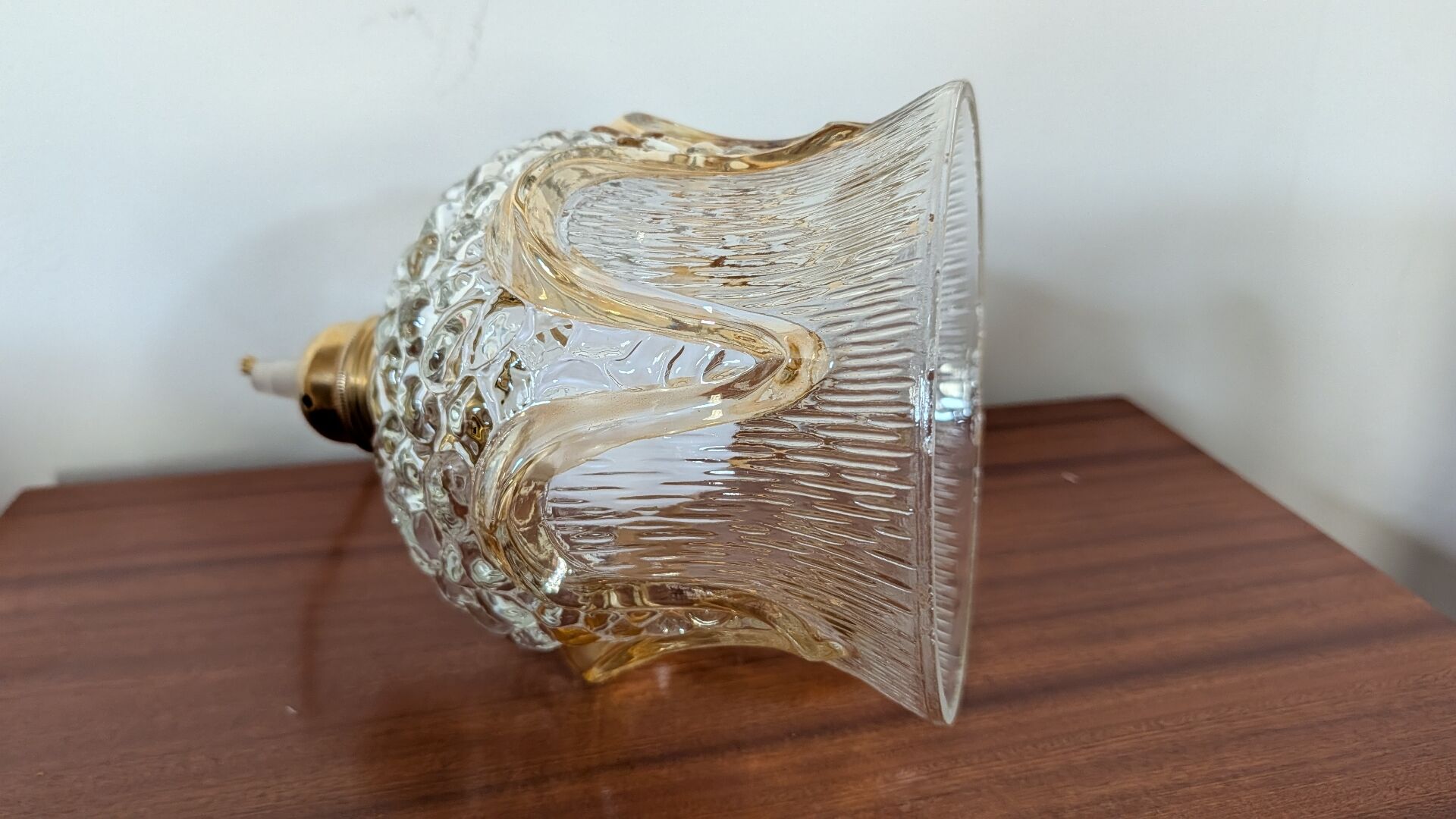 Bulged glass lampshade and 6 amber arches