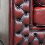 Beautiful red cowhide sleekly designed Chesterfield 2-seater sofa