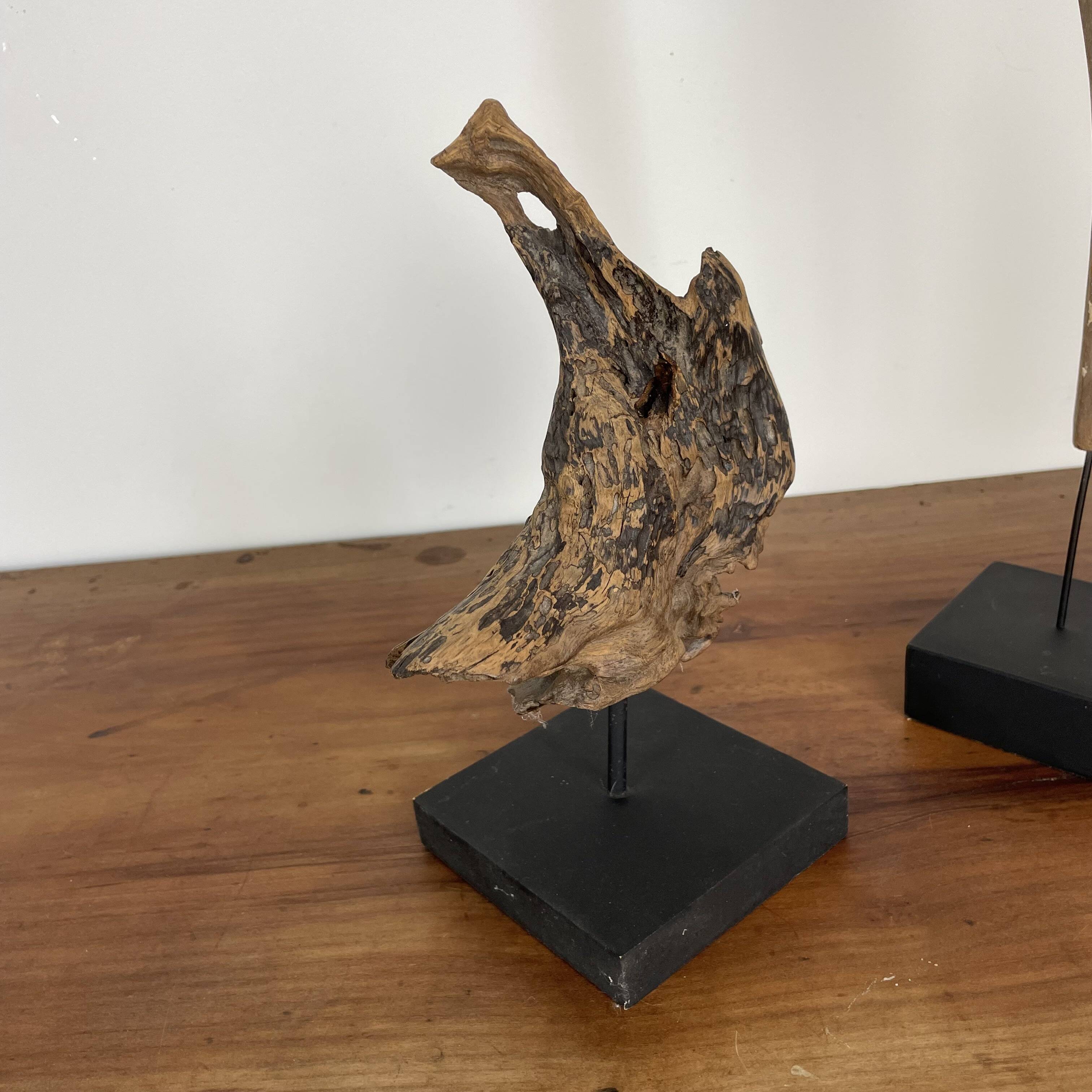 Set of 2 wooden sculptures on base
