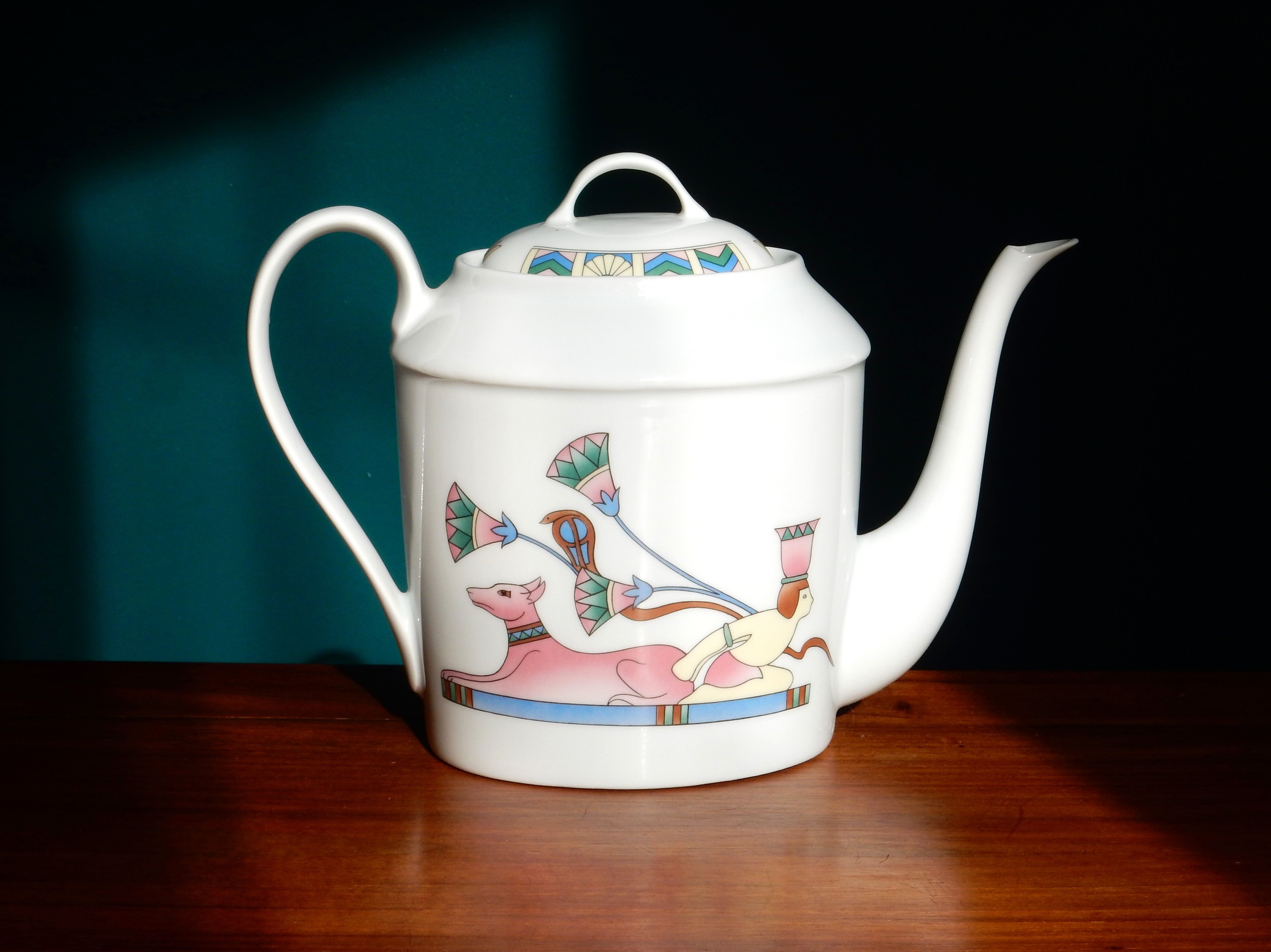 Limoges coffee maker inspired by ancient Egypt in the style of the 80s