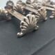 Silver-plated shell knife rests. Ravinet Denfert.