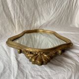 Ancien miroir mural biseauté en bois massif doré