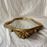 Ancien miroir mural biseauté en bois massif doré