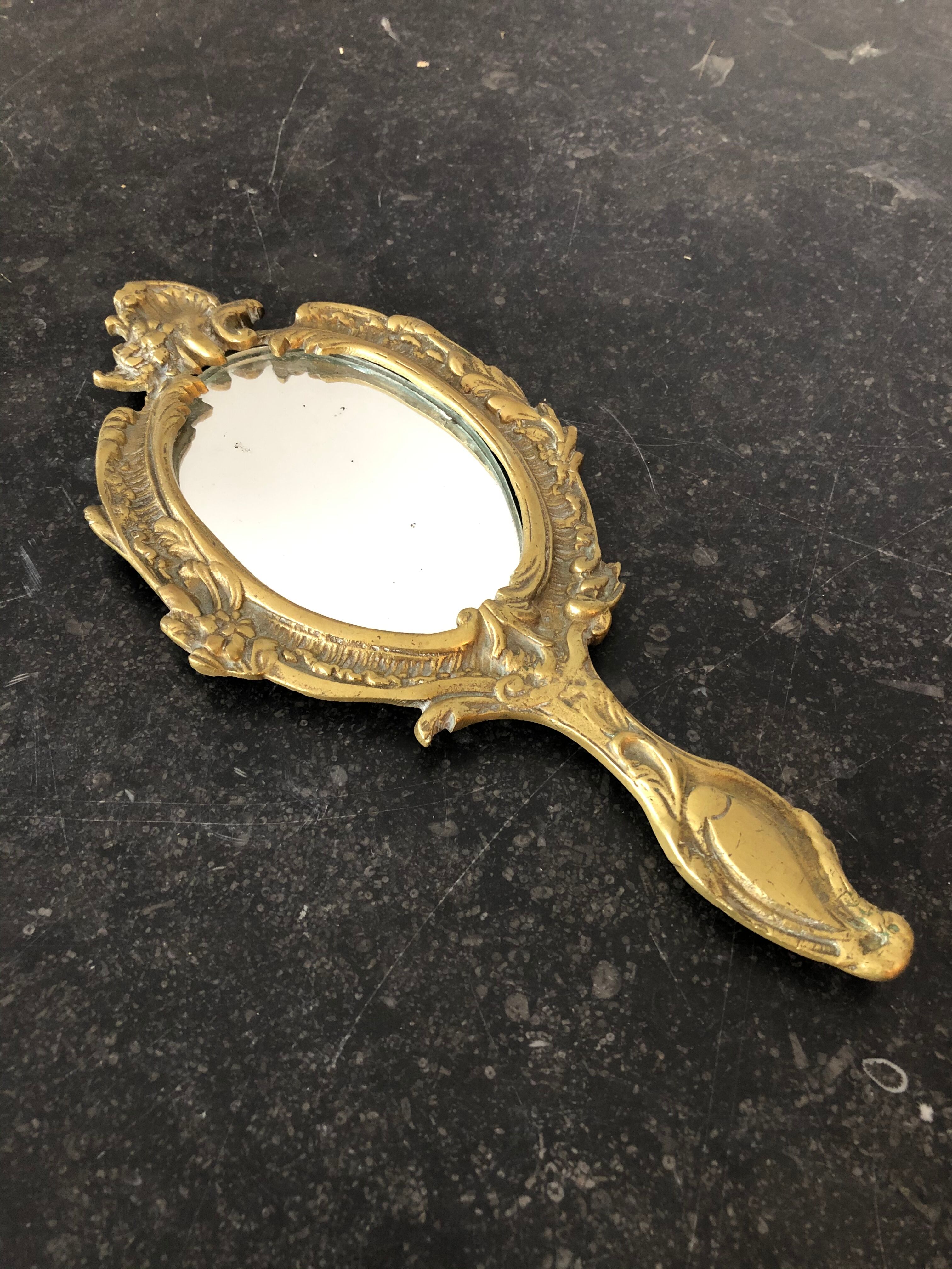 Brass hand mirror
