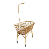 Rattan cradle with arrow