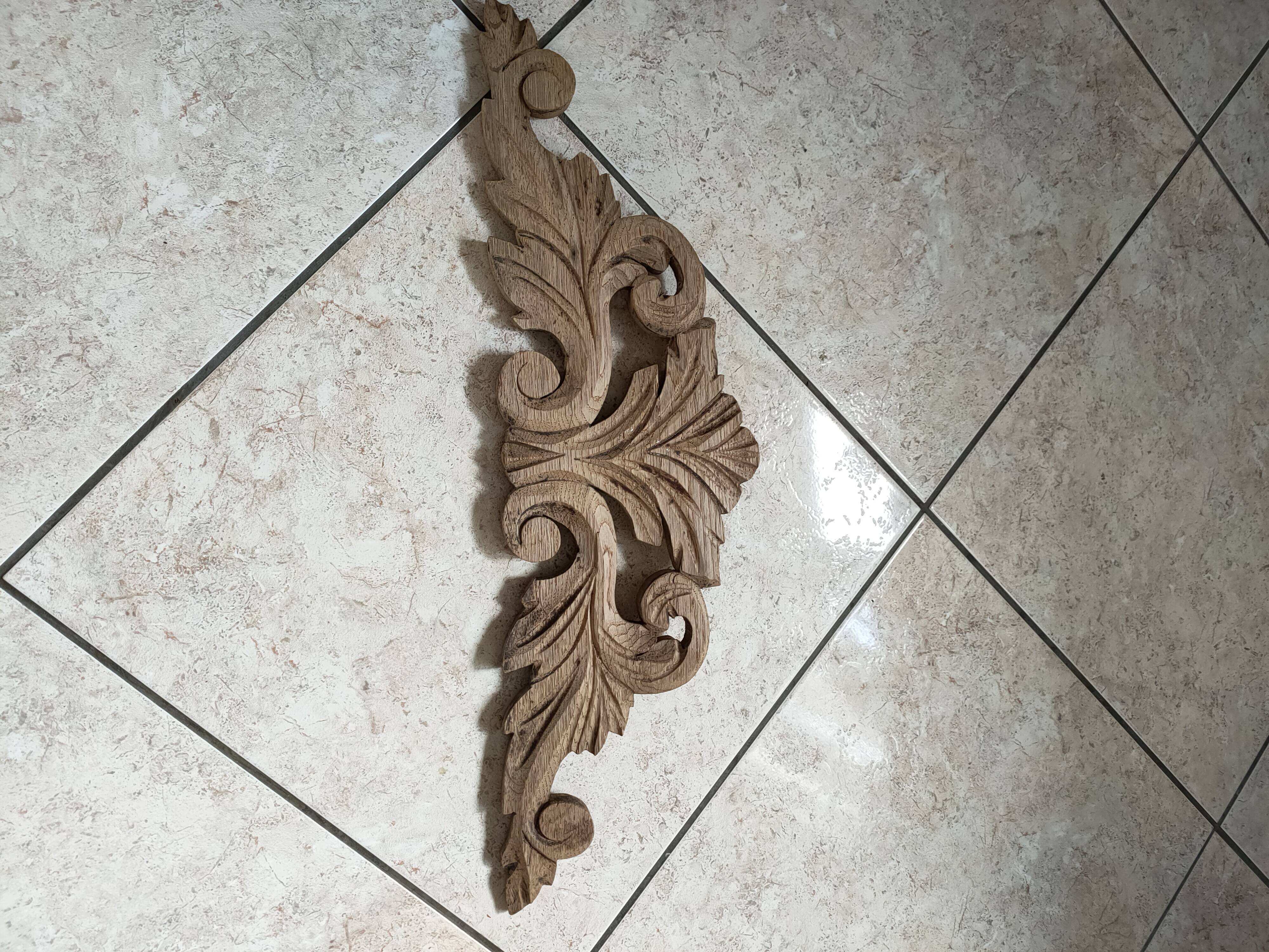 Old pediment in cut wood