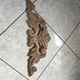 Old pediment in cut wood