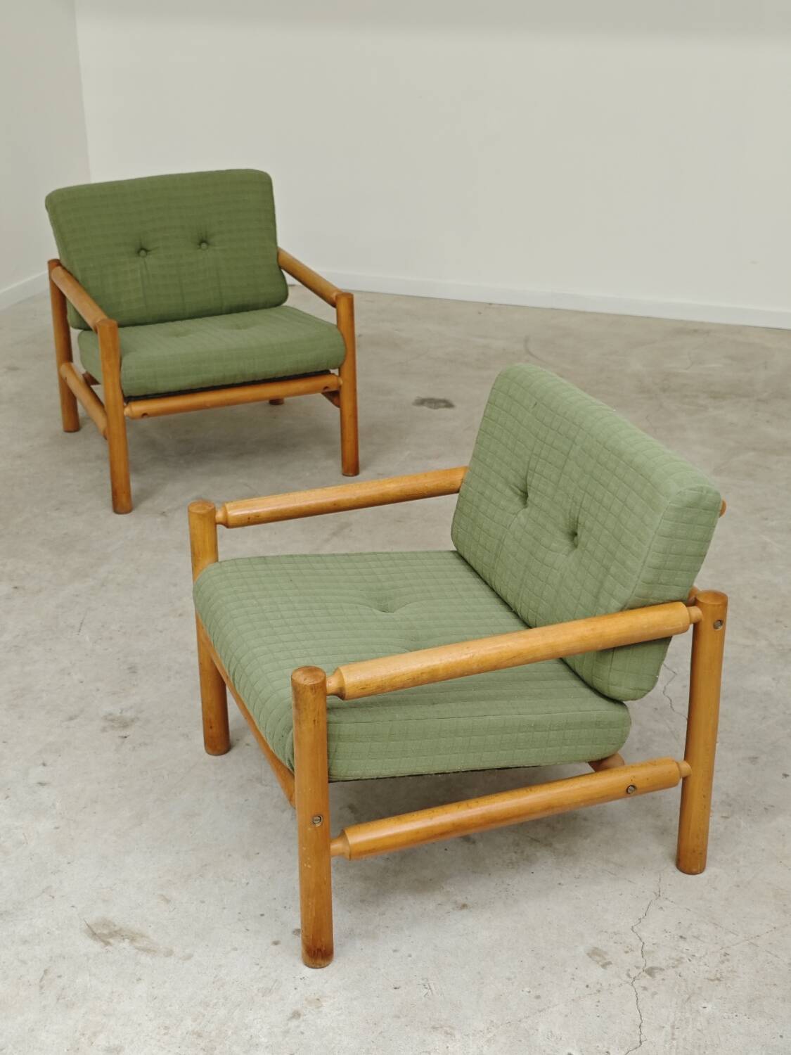 Pair of chalet style armchairs in green fabric