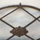 Grille ovale décorative en fer forgé début XXème