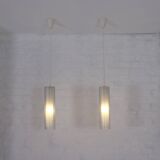 Doria pendant lights in lined frosted glass.
