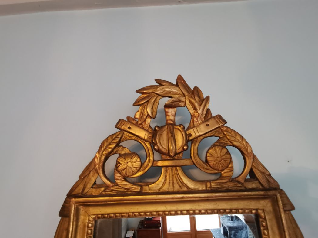 Miroir Louis XVI bois sculpté doré 64x38cm