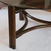 Round coffee table in rattan and smoked glass — 1970s