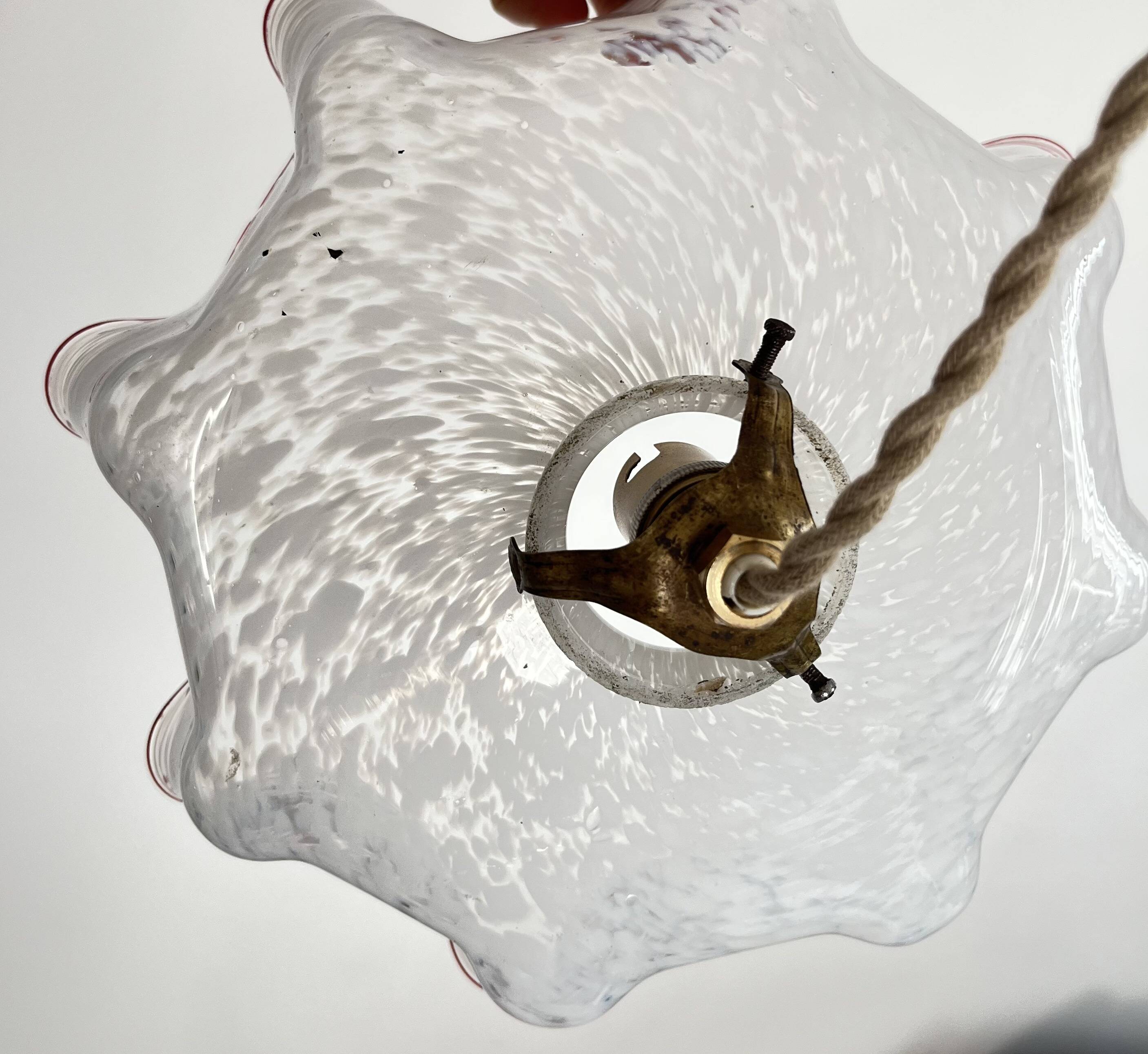 White clichy skirt suspension with raspberry spun glass edge