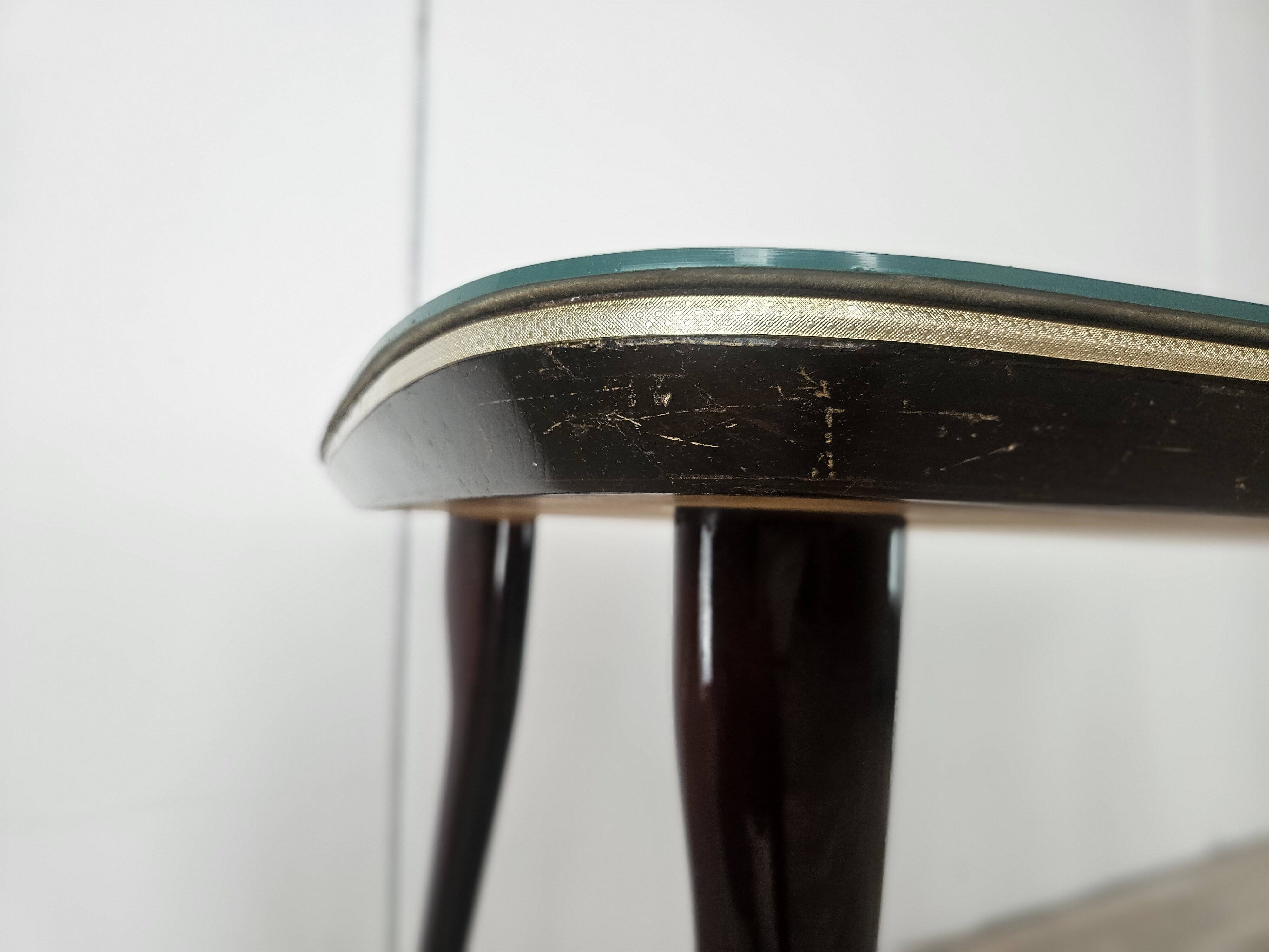 Mid-century mahogany dining table with aquamarine glass top