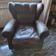 Italian leather bergère armchairs