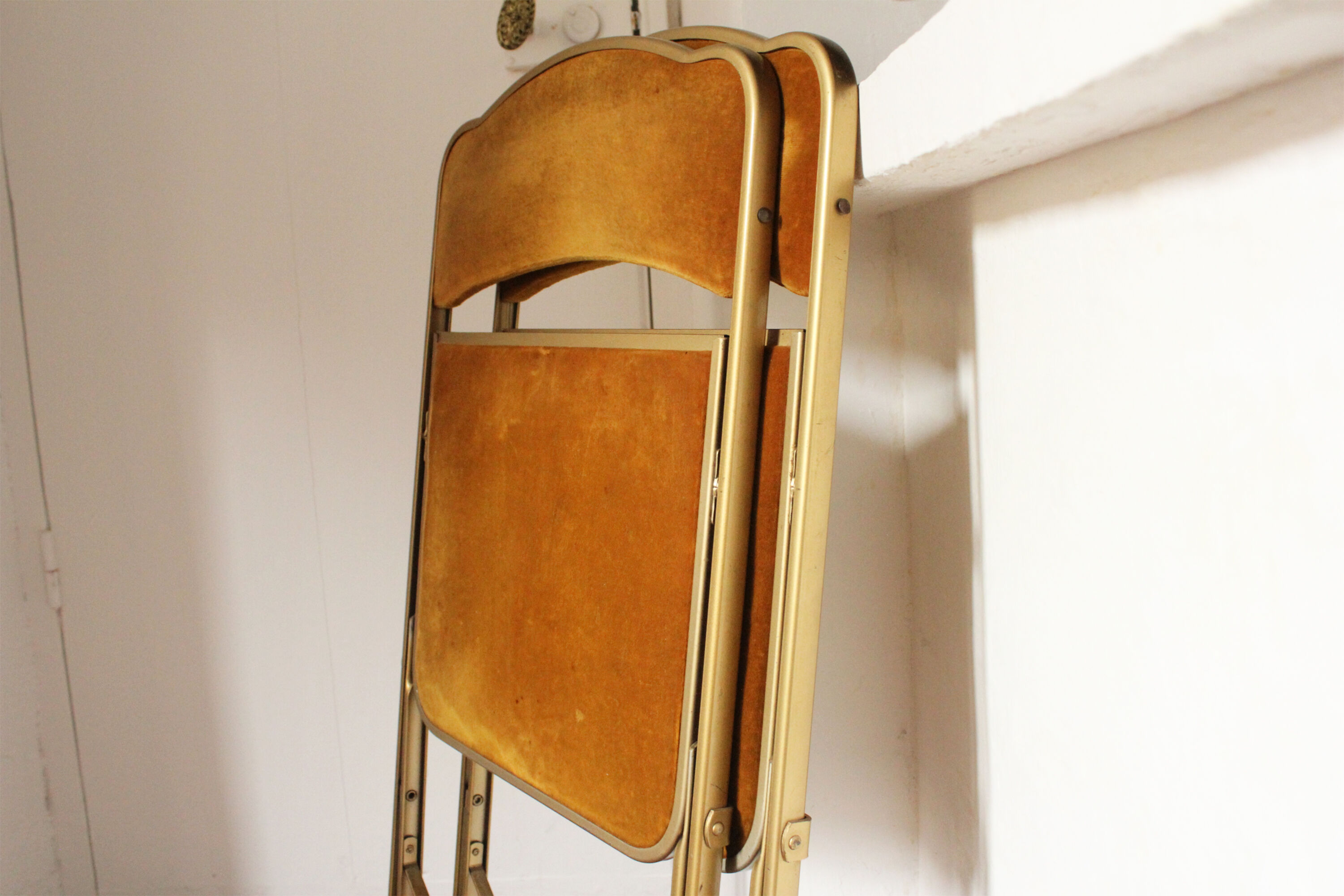 Folding chaisor chairs, gold structure and vintage golden yellow velvet