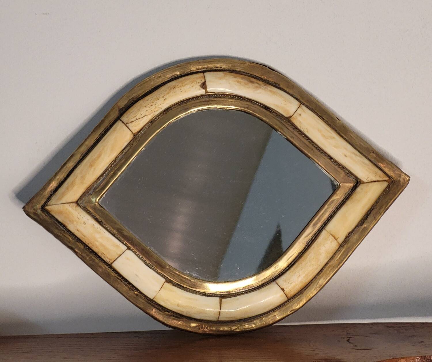 Brass and bone mirror