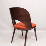 Scandinavian design orange papaya shell dining chairs