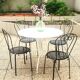 Salon de jardin, Table ronde blanche en fer forgé. et 4 chaises en acier lourd, noire d’origine