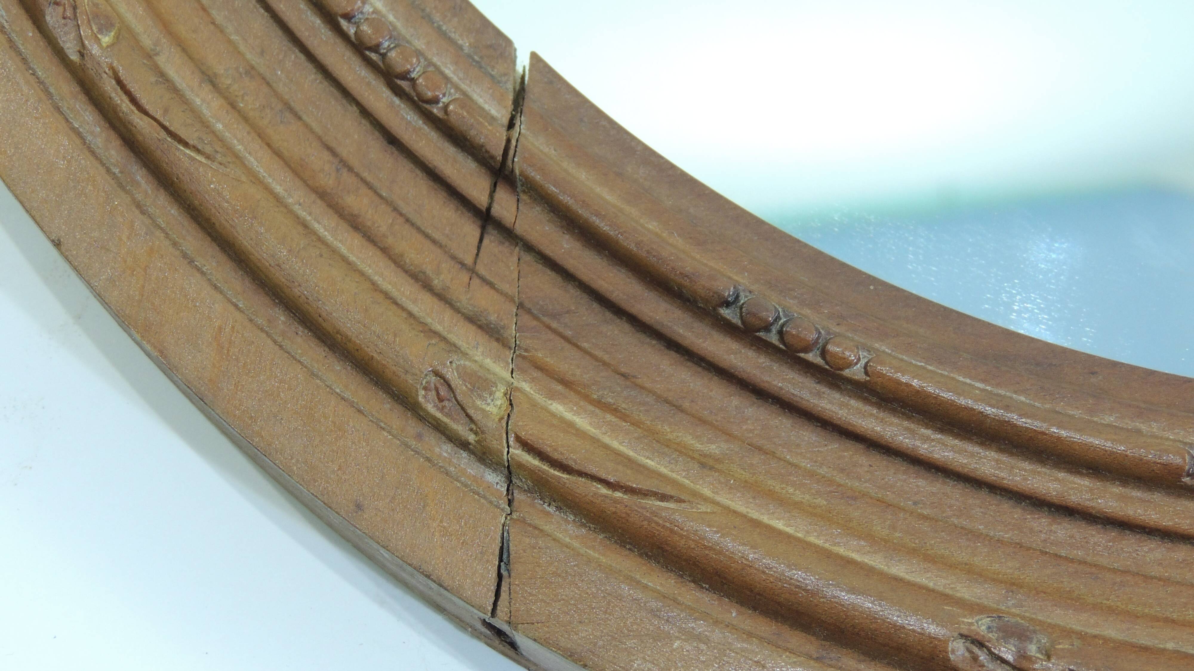 Antique oval mirror in carved wood – Louis XVI style, ribbon bow decoration, mid