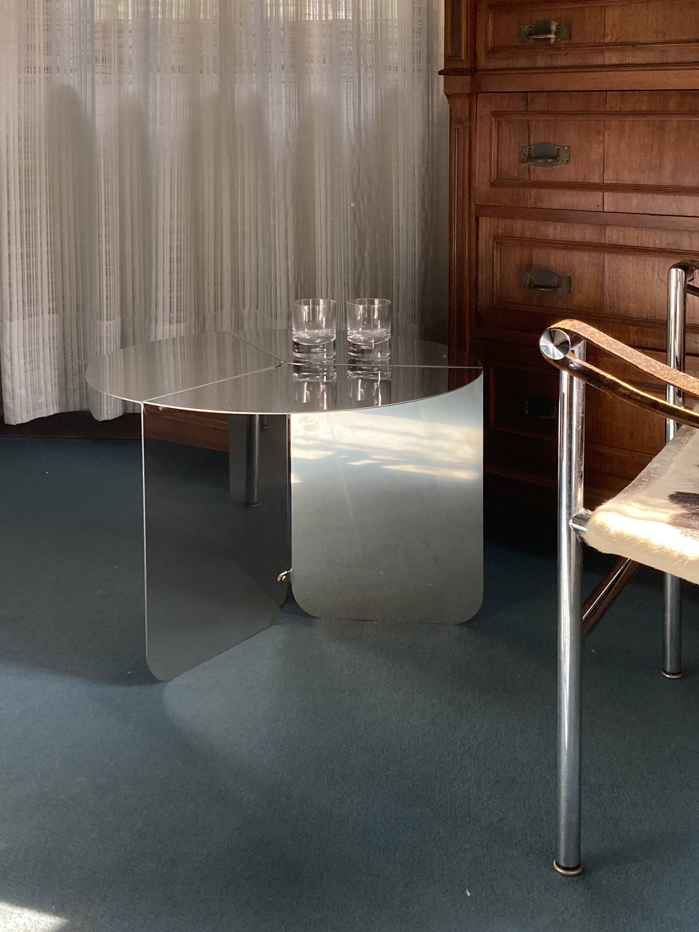 "120" coffee table in stainless steel, minimal design by folding metal