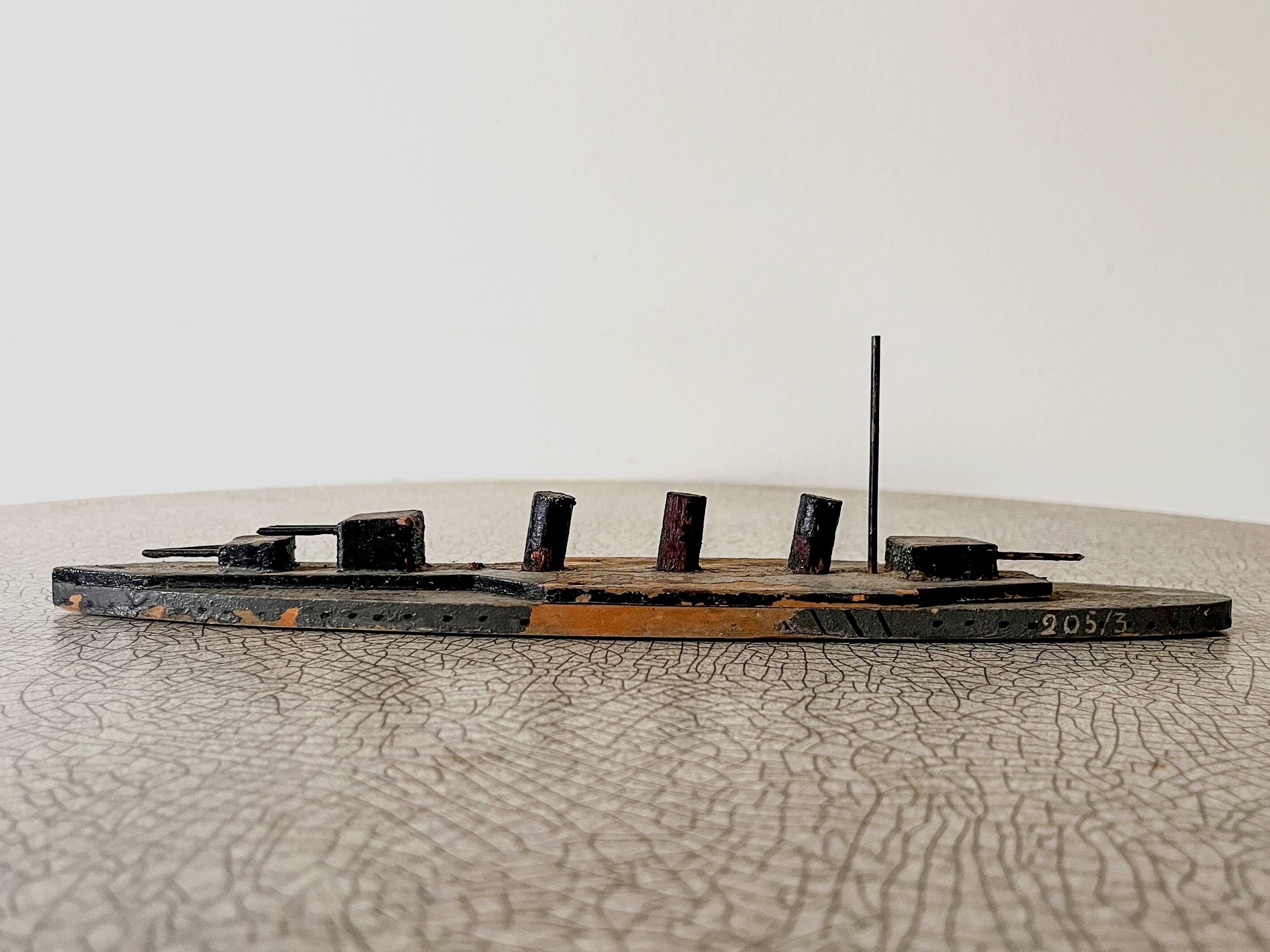 Wooden destroyer boat, antique toy from the early century.