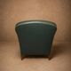 Fauteuil club en simili-cuir et noyer