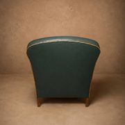 Fauteuil club en simili-cuir et noyer