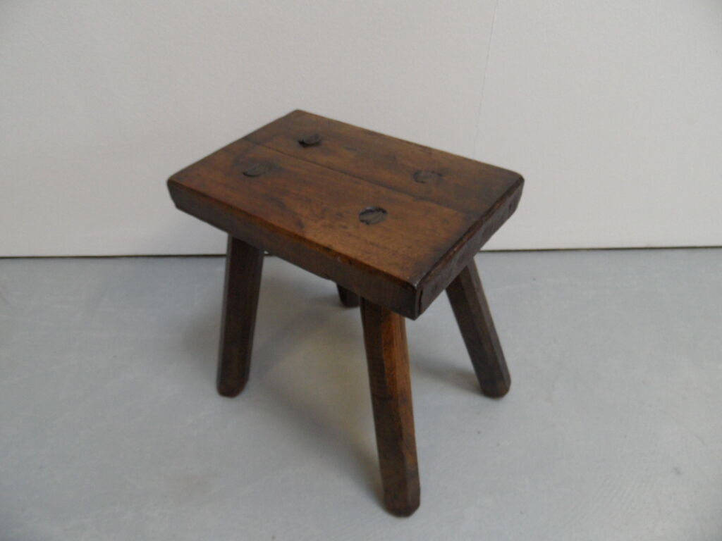 Antique milk stool