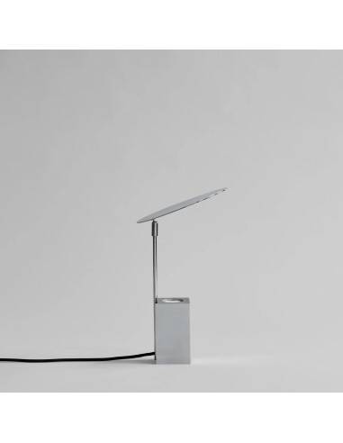 Reflect table lamp in chrome metal, contemporary work.