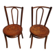 pair of bistro chairs, curved wood and pattern on the seat