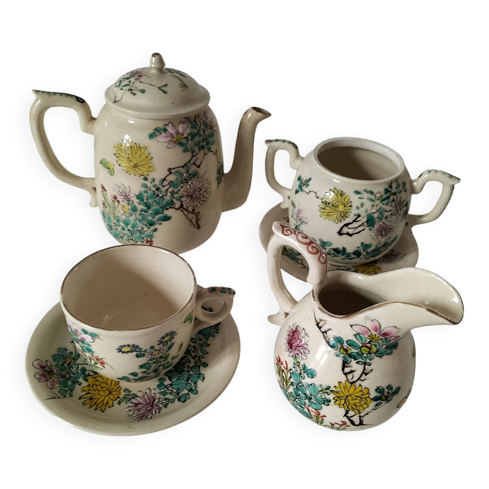 Japanese-style tea set in cracked earthenware with chrysanthemum flowers