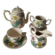 Japanese-style tea set in cracked earthenware with chrysanthemum flowers