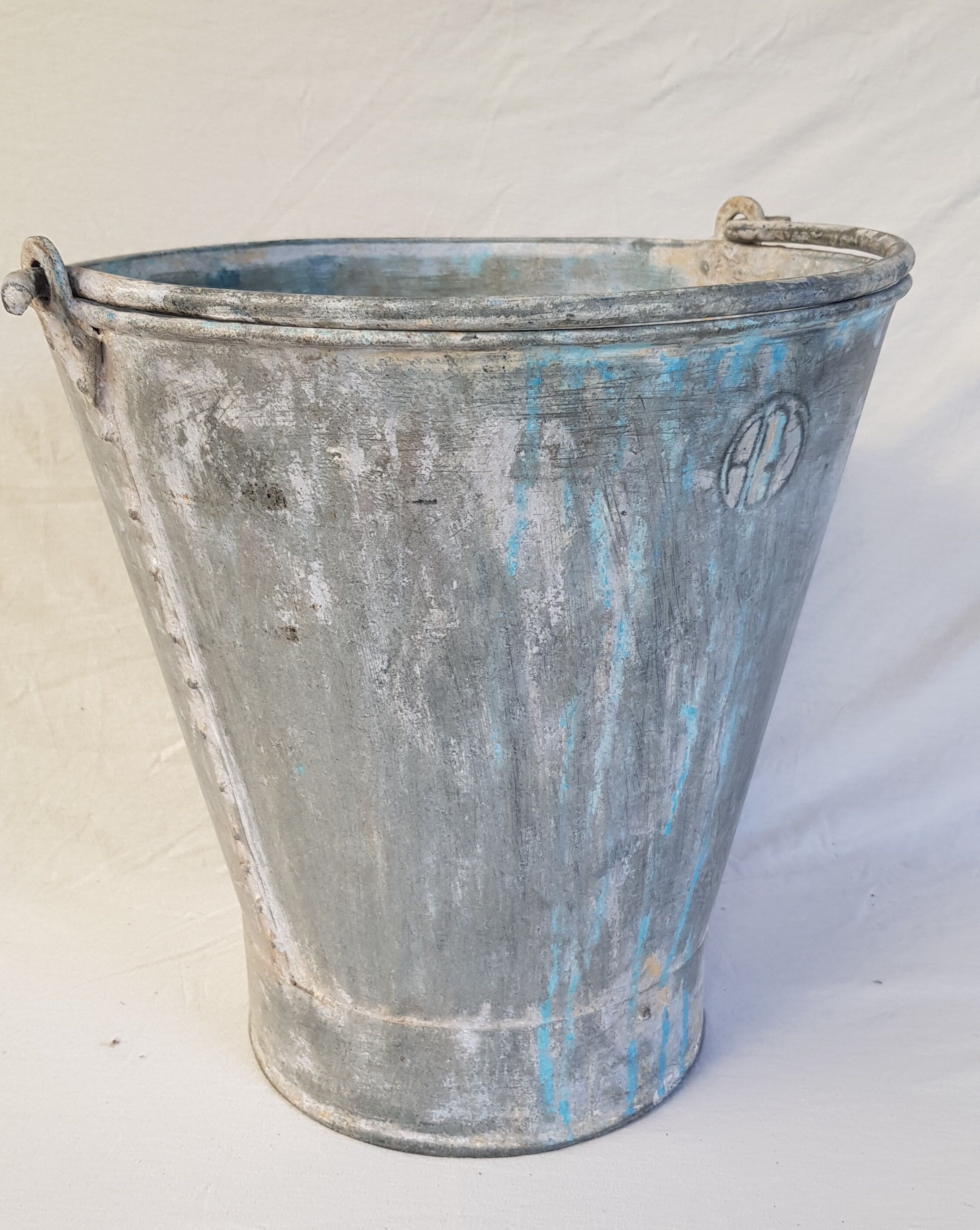 Old bucket with thick zinc handle