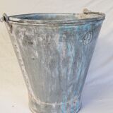 Old bucket with thick zinc handle