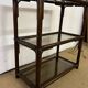 Rattan and smoked glass bookcase shelf