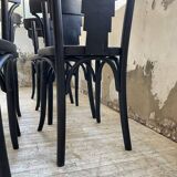 Set of 7 black bistro chairs
