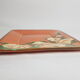 Dish or plate Pottery Galtié enamelled terracotta decorated with flowers, 24.5 cm