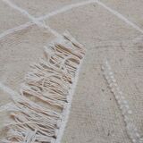 Hand-made beige and white wool rug 65x144cm