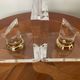 Vintage pair of bookends in lucite and brass from the 1970s.