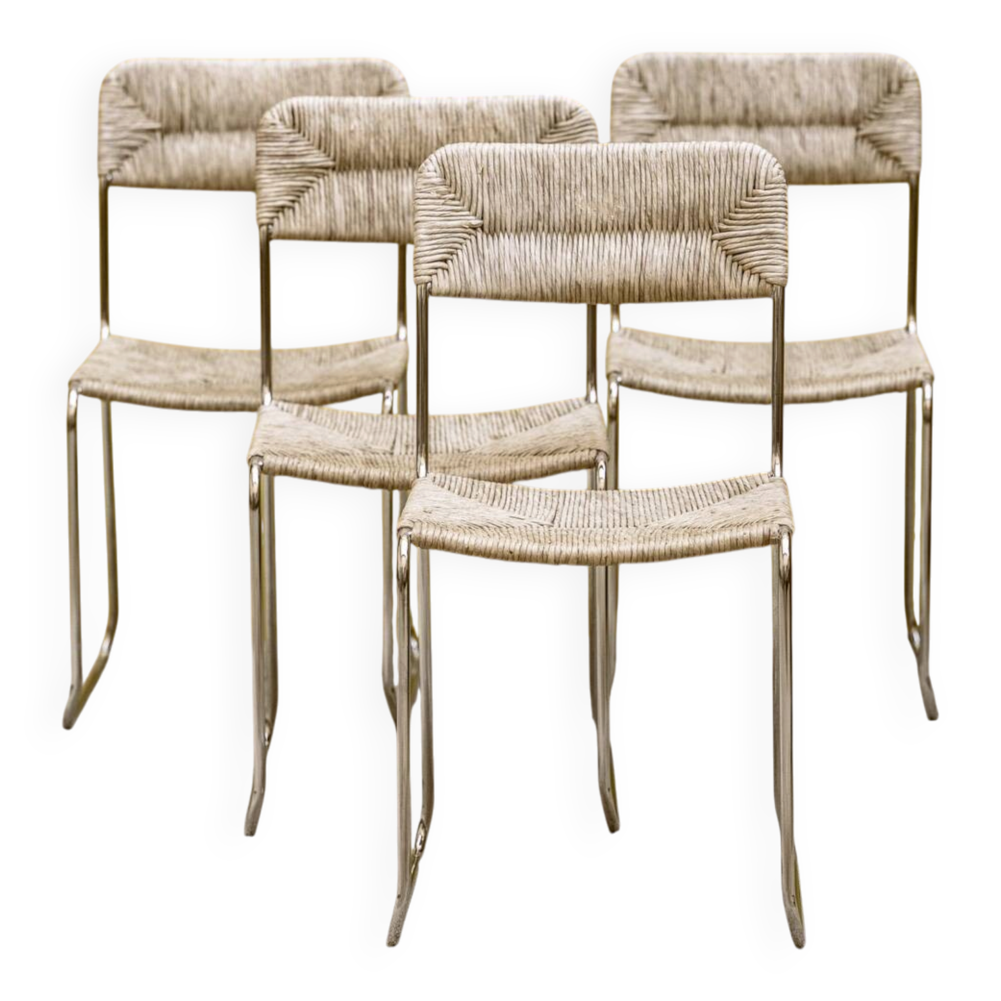 Four straw-seated chairs from 1980.