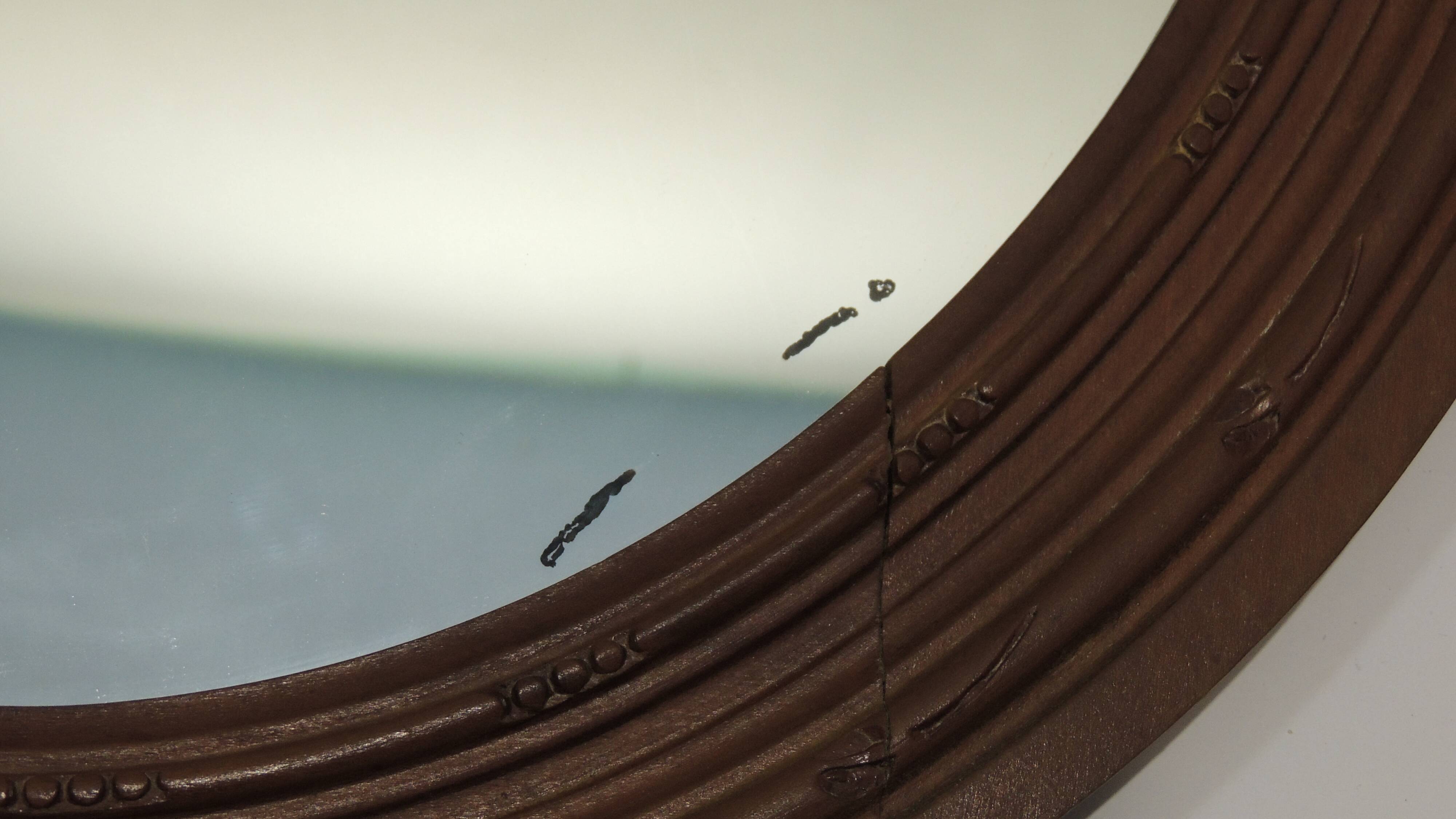 Antique oval mirror in carved wood – Louis XVI style, ribbon bow decoration, mid