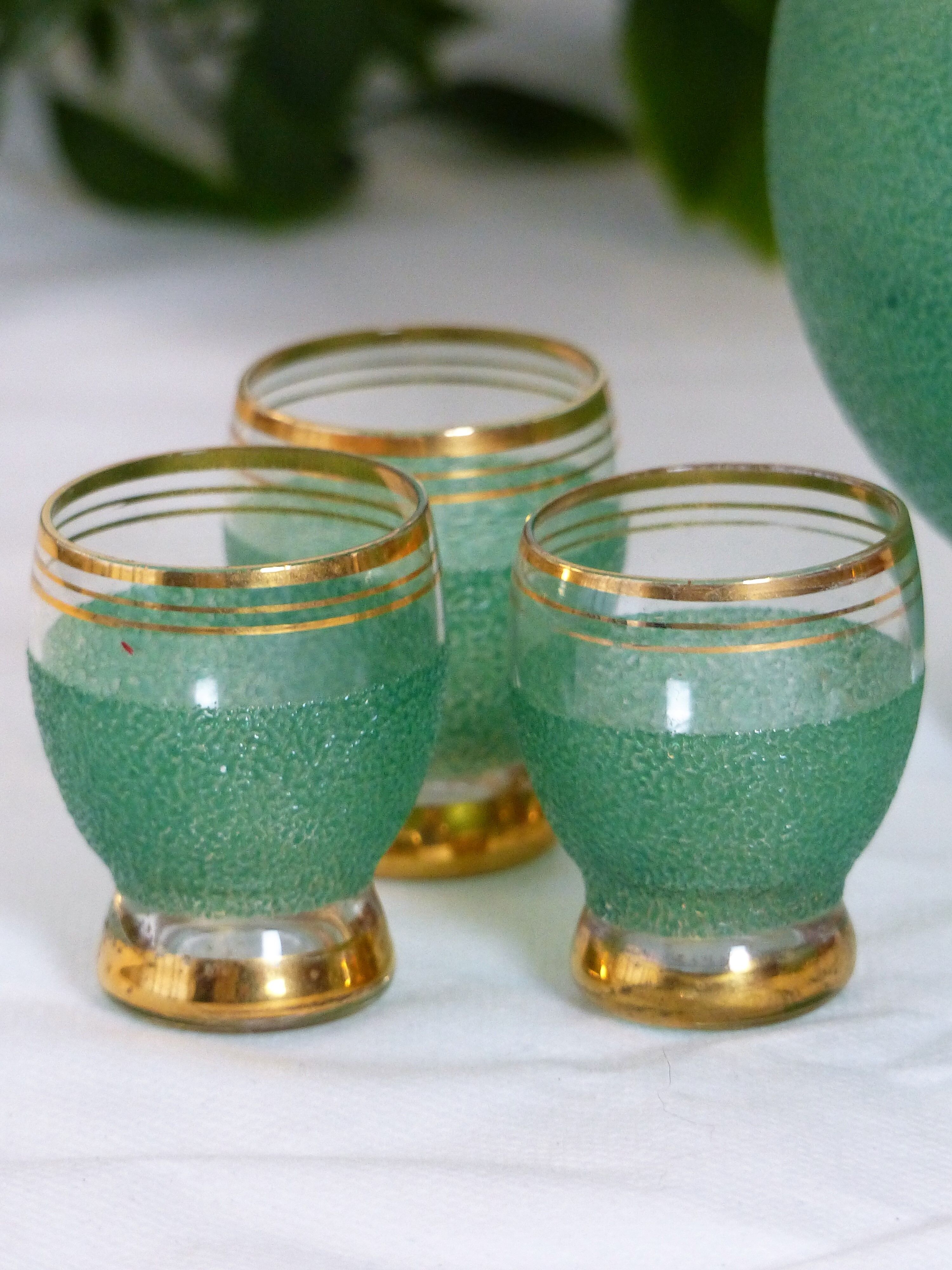 Green liqueur carafe and its 6 glasses