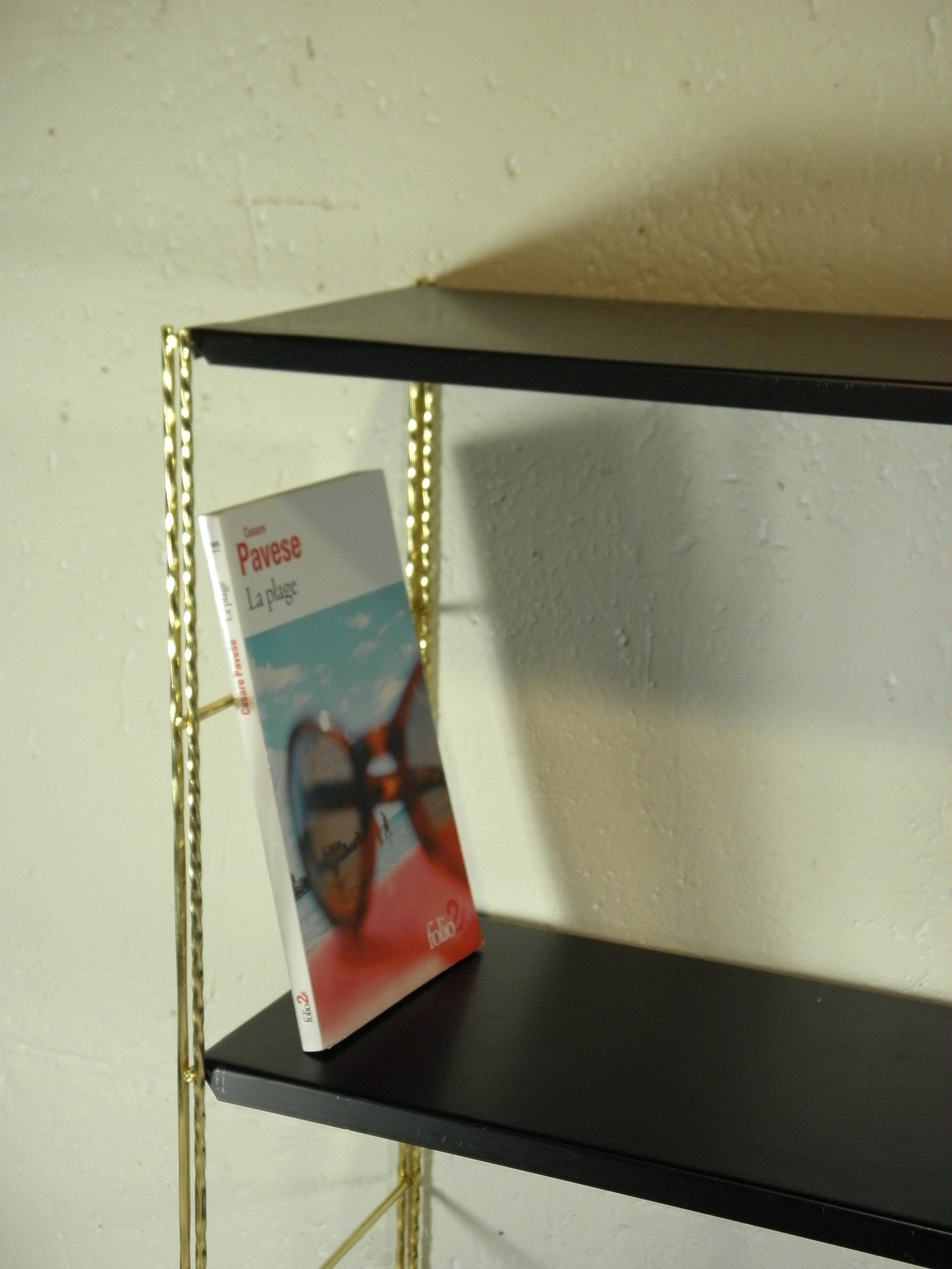 Black and gold metal wall shelf from the 1960s