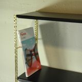 Black and gold metal wall shelf from the 1960s