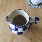 Blue and white checkerboard water pitcher