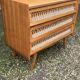 Rattan chest of drawers with tapered legs