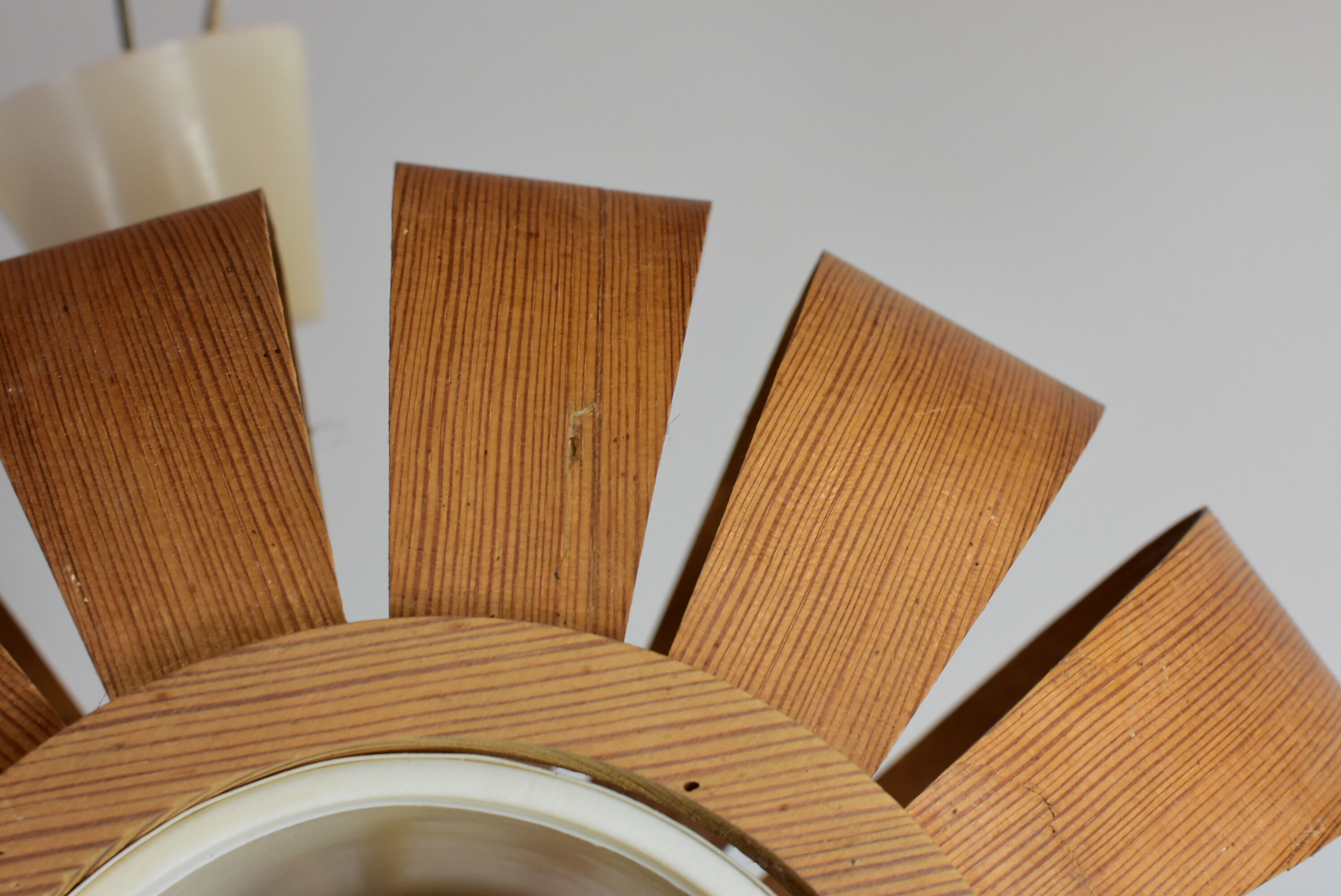 Scandinavian-style wooden pendant light.