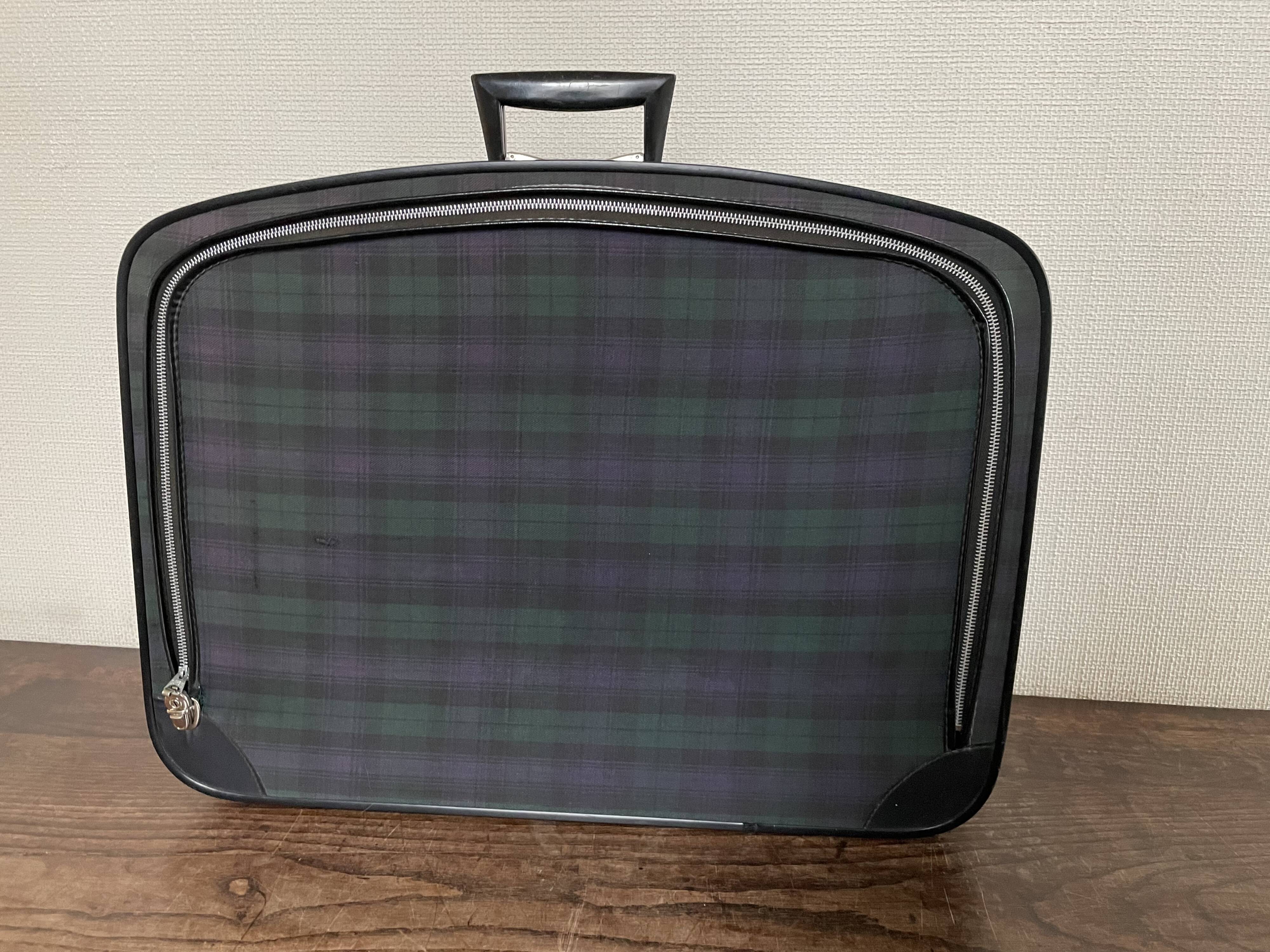 Tartan check suitcase